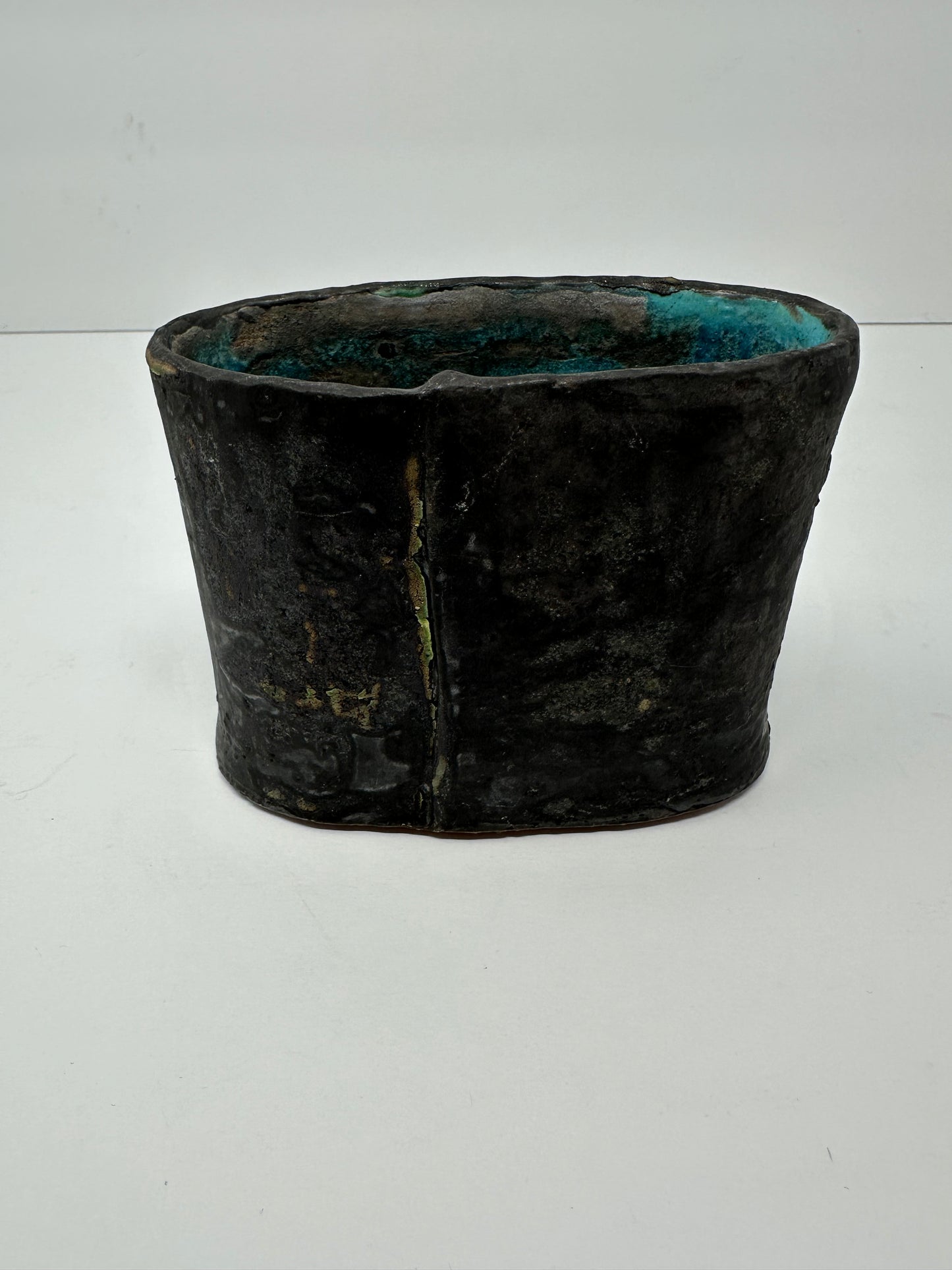 Black and blue ceramic vase. Rustic boho chic look. Textured ceramic